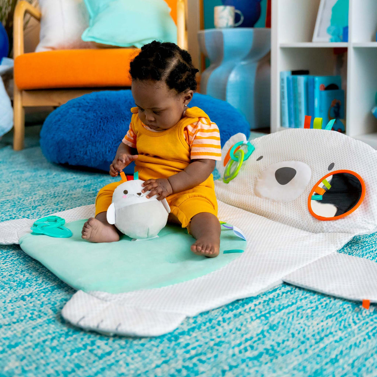 Colorful Bright Starts Play Gyms & Mats with interactive toys and cushioned surfaces for baby development