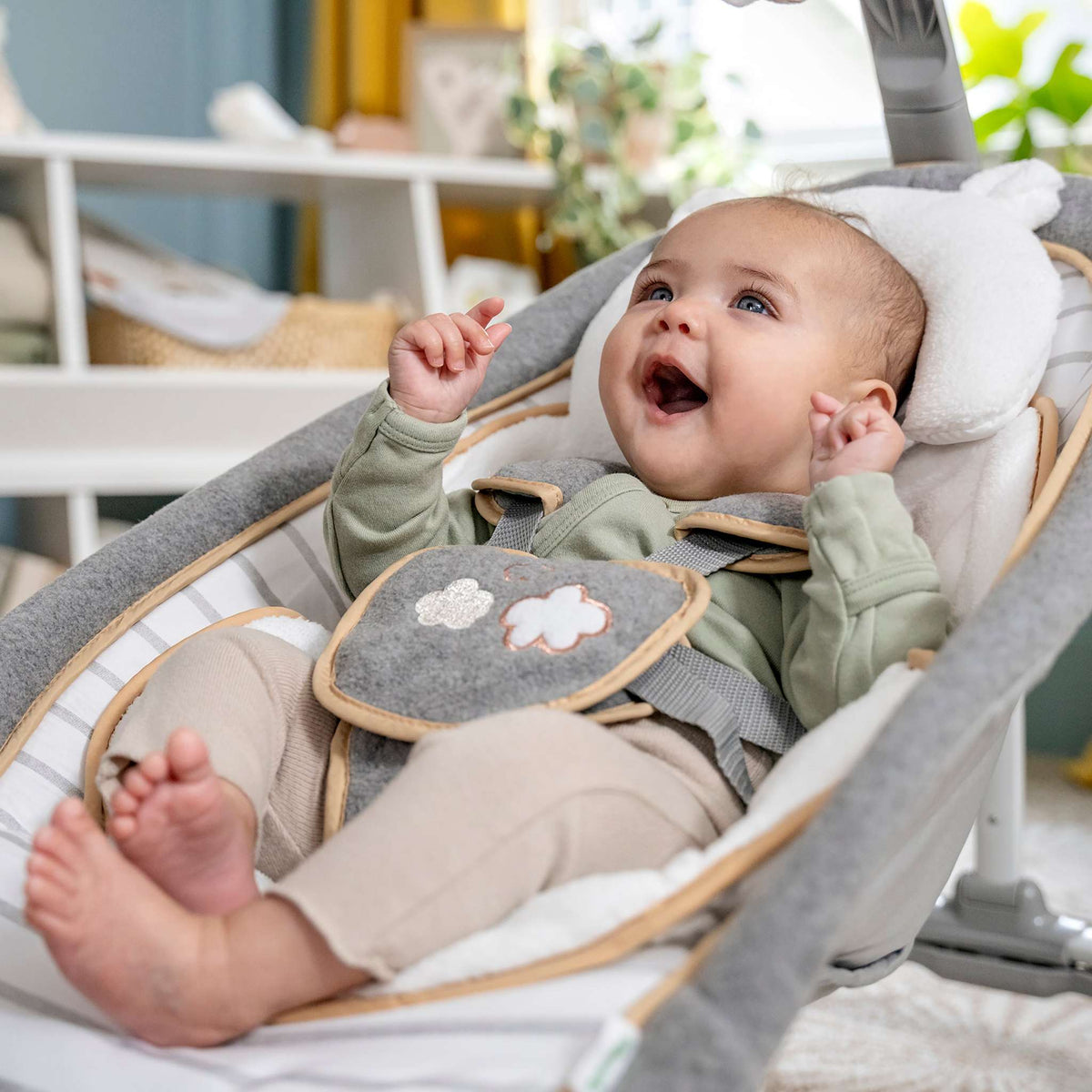 Portable Ingenuity Travel Swing with foldable frame, soothing motion, and plush baby comfort
