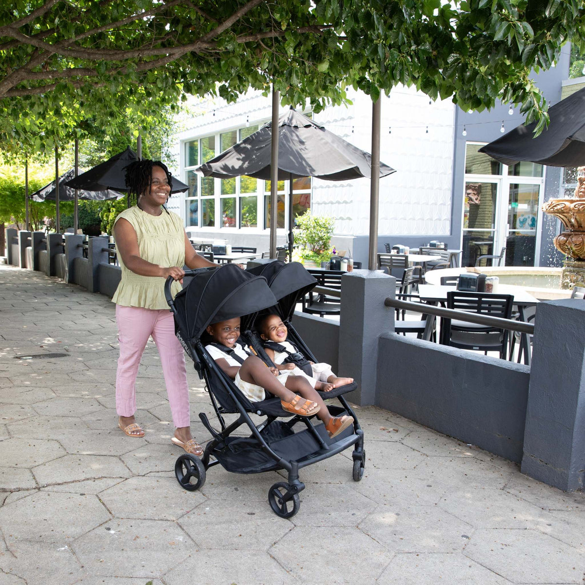 Modern convenience stroller for parents with ergonomic design and compact fold feature