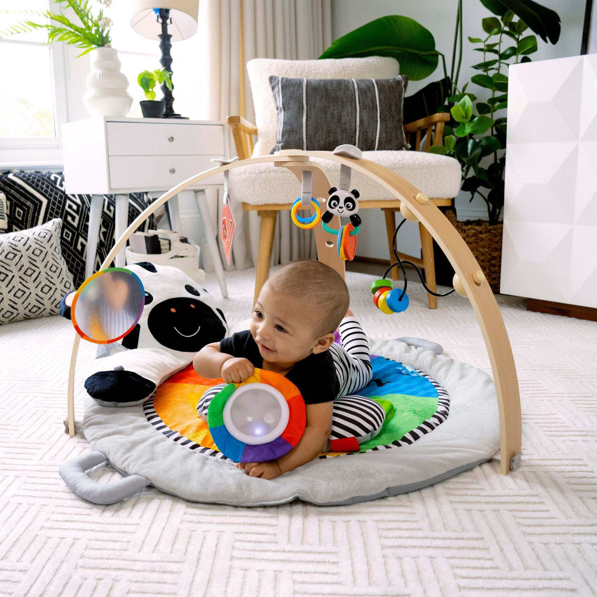 Baby Einstein play gym with colorful interactive toys and mat