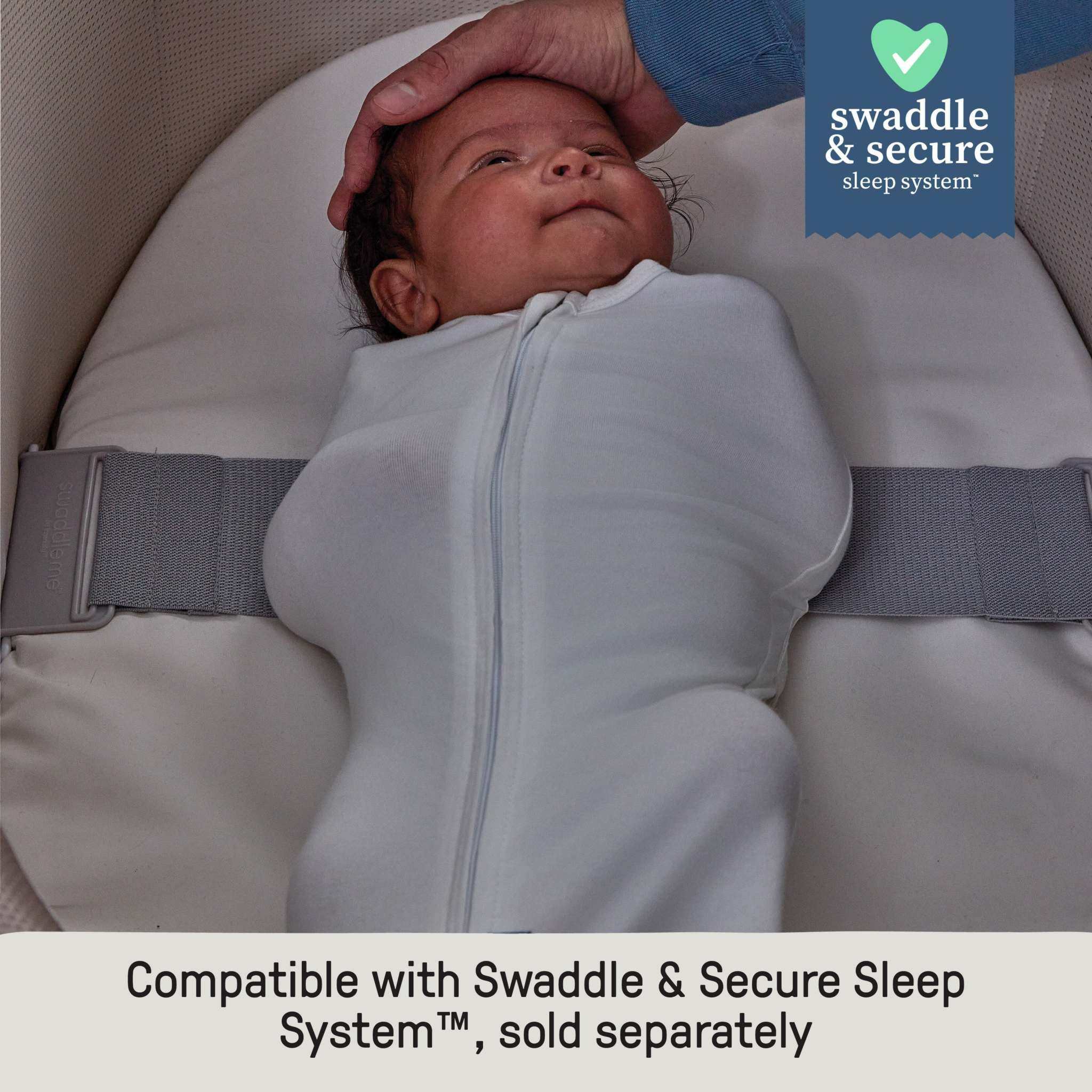 Ingenuity Snooze & Stow easy-folding bassinet in sand color with sound, light, and vibration