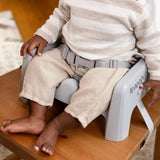 Ingenuity Deluxe Learn-to-Dine Feeding Seat with lock-in Twist & Dine plates and 3-point harness for infants and toddlers