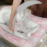 Ingenuity Keep Cozy 3-in-1 baby bouncer and rocker in pink with plush bunny toy