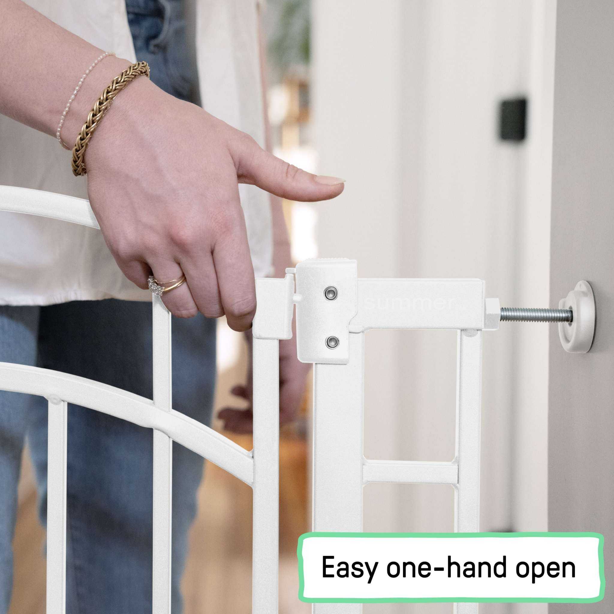 White Ingenuity Doorway 48W Series pet and baby safety gate installed in doorway