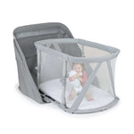Ingenuity Dream Retreat Oval Fitted Sheet with starlight print for baby portable sleep solution