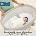 Right Height Adjustable Bassinet with 4 height levels, soothing vibration, light, and sound in sand color