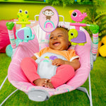 Bright Starts Pink Paradise Vibrating Baby Bouncer with toys and harness