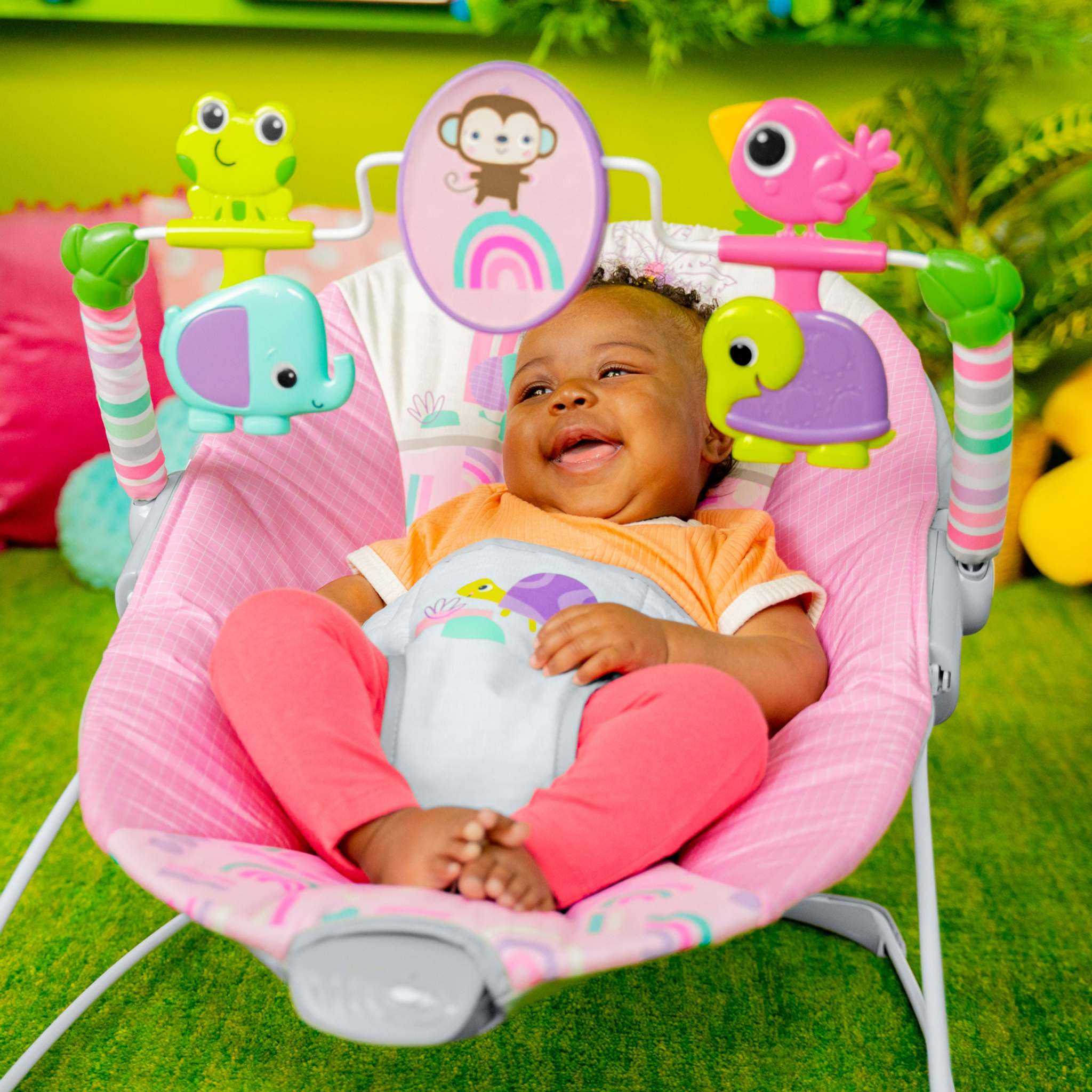 Bright Starts Pink Paradise Vibrating Baby Bouncer with toys and harness