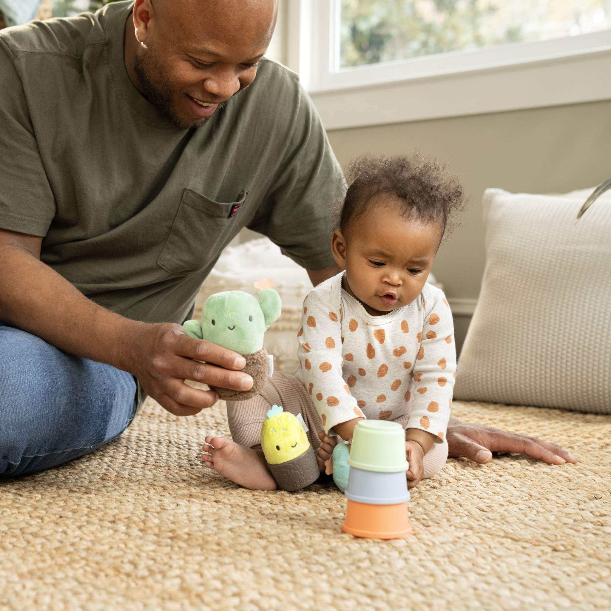 Ingenuity Calm Springs Nesting Rattles baby toy set with multi-textured stackable plant rattles for tactile play and learning