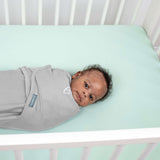 SwaddleMe by Ingenuity preemie size ivory swaddle for 0-2 months baby, 100% cotton, secure hook-and-loop closures