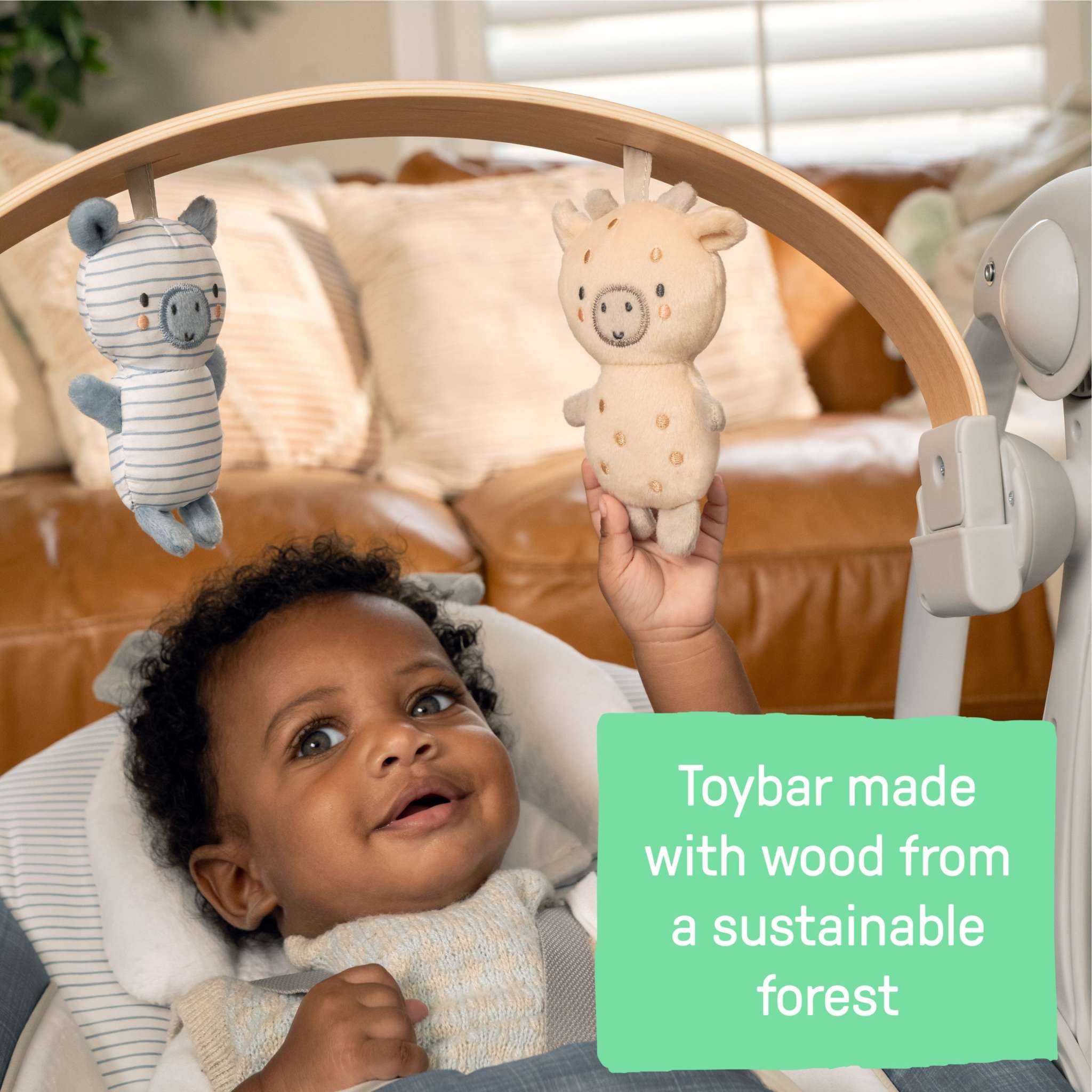 Ingenuity Swing ‘n Go portable baby swing in chambray with removable wooden toy bar and plush seat pad