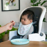 Ingenuity Easy Eater 4-Pack absorbent cotton baby bibs with terry backing and animal prints