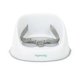 Grey Ingenuity Simplicity Seat Easy-Clean Baby Booster Seat attached to dining chair