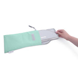 Ingenuity FoldAway Travel Potty Seat folded with travel bag showing compact, portable toddler potty trainer design