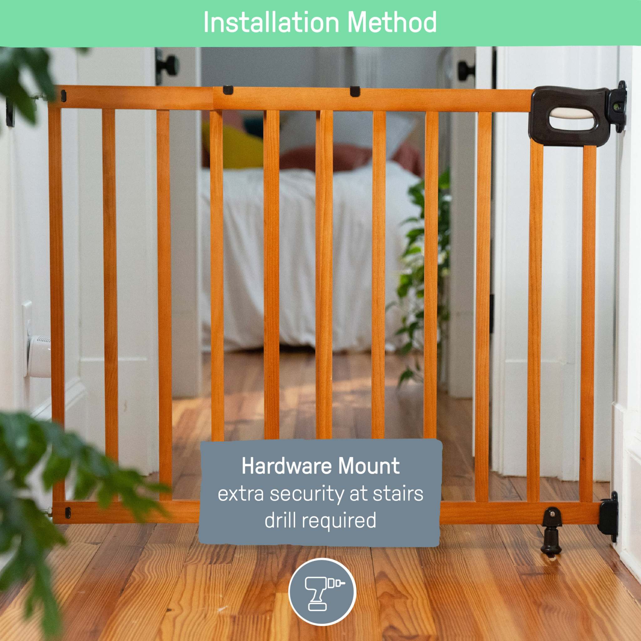 Ingenuity The Stairway 48W Series brown wood safety gate for stairs and hallways with comfort grip handle and locking indicator