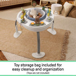 Ingenuity Bounce to Bloom™ 2-in-1 baby jumper and activity center with chambray fabric and 360° rotating seat for ages 6 to 24 months