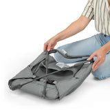 Stow & Go Compact Folding Bouncer lightweight fold-flat baby seat with calming Vibe-Pod and removable rattle toy
