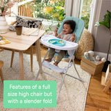 Ingenuity Sun Valley Compact Folding High Chair in teal with adjustable tray and 5-point harness