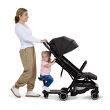 Ingenuity FoldAway Ride-On Board with removable seat attached to stroller for toddler standing or seated ride