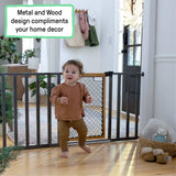 Ingenuity Thruway 60XW Series pet and baby safety gate with honey oak frame