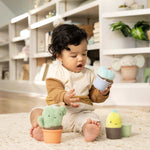 Ingenuity Calm Springs Nesting Rattles baby toy set with multi-textured fabric and plastic plants and potters for stacking and nesting play