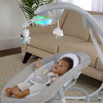 Ingenuity InLighten 2-in-1 baby swing and rocker with mesh fabric and light-up mobile toys