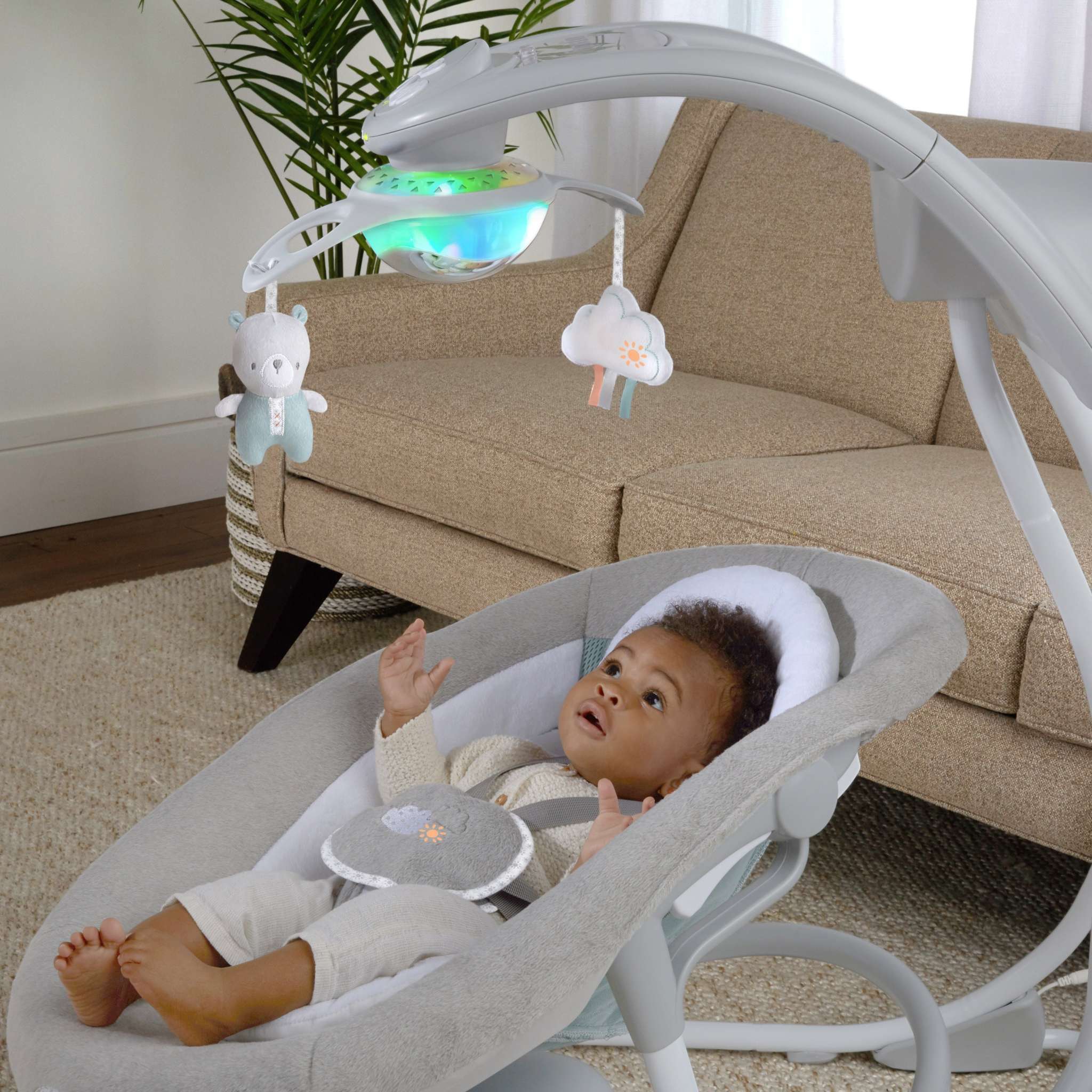 Ingenuity InLighten 2-in-1 baby swing and rocker with mesh fabric and light-up mobile toys