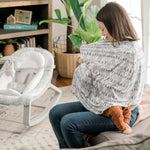 Ingenuity Good to Go 4-in-1 multi-use cover in Kimber color used as nursing cover and scarf for baby protection