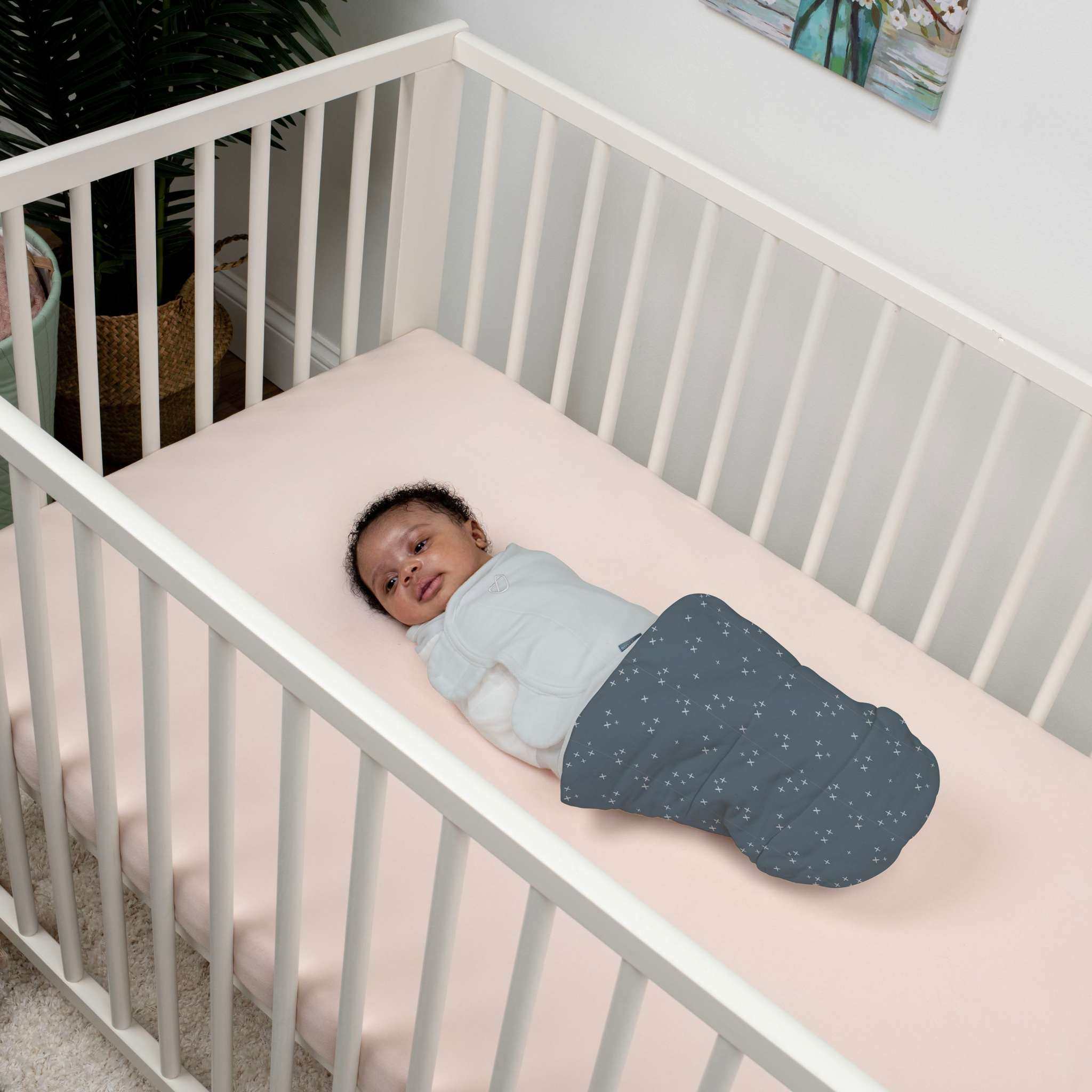 SwaddleMe by Ingenuity All Season Swaddle for newborns 0-3 months in Stardust pattern with adjustable wings and hook-and-loop closures