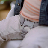 Grey Ingenuity Simplicity easy-clean baby booster seat with washable straps attached to dining chair