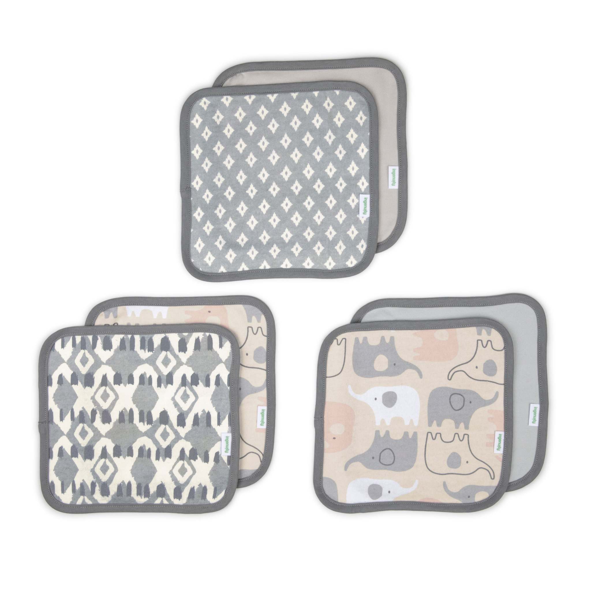 Set of four baby bibs with different patterns on a white background