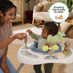 Ingenuity Bounce to Bloom™ 2-in-1 baby jumper and activity center with chambray fabric and interactive toys for ages 6 to 24 months
