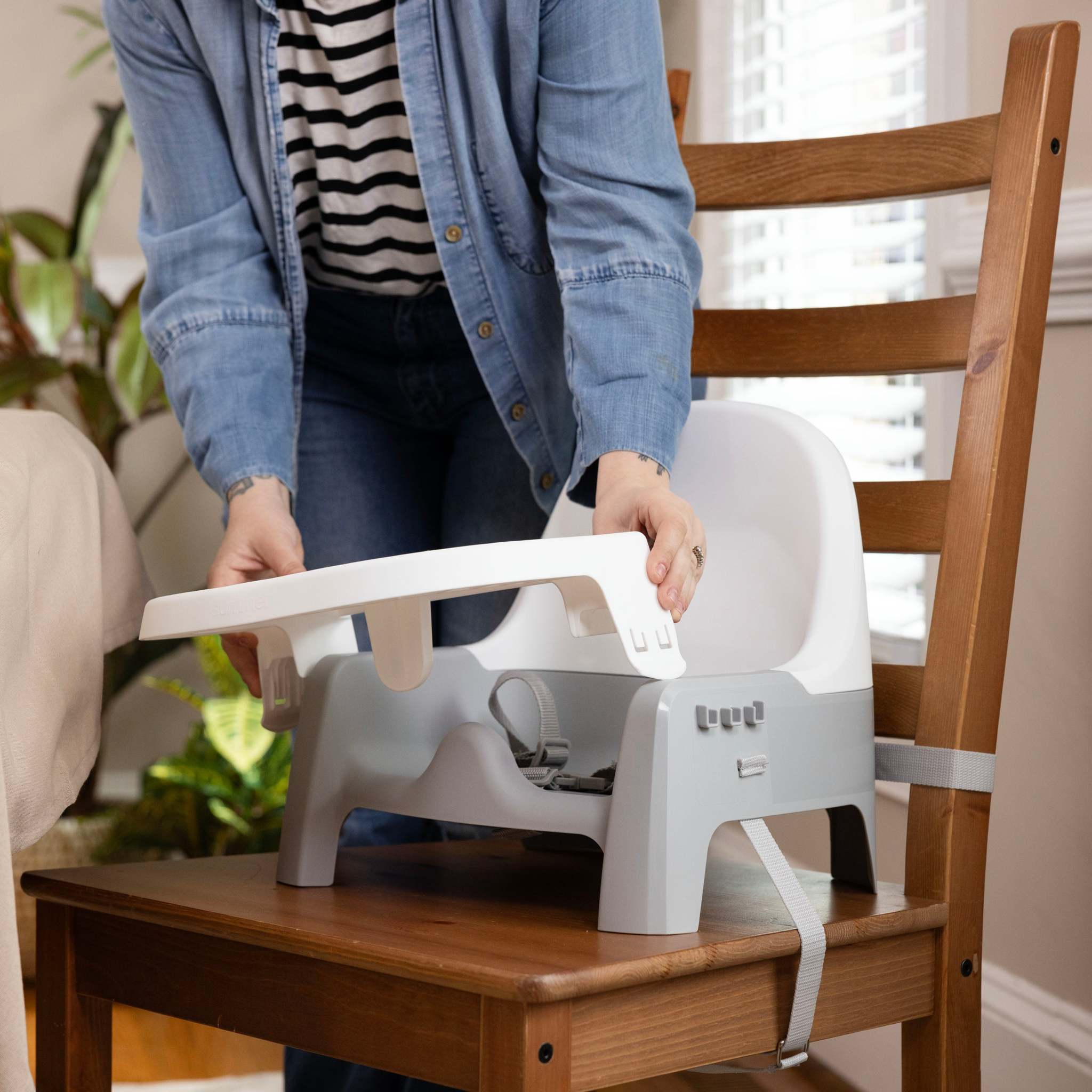 Ingenuity Deluxe Learn-to-Dine Feeding Seat with lock-in trays and 3-point harness for babies and toddlers