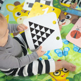 Baby Einstein Discovery Garden Tummy Time Mat with mirror, bright colors, toys, and flashcards for infant play and learning
