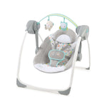 Baby in Comfort 2 Go Portable Swing with plush forest toys and soothing music
