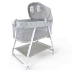 Ingenuity Lullanight Soothing Bassinet with mesh sides, soft night light, adjustable canopy, and storage for baby essentials