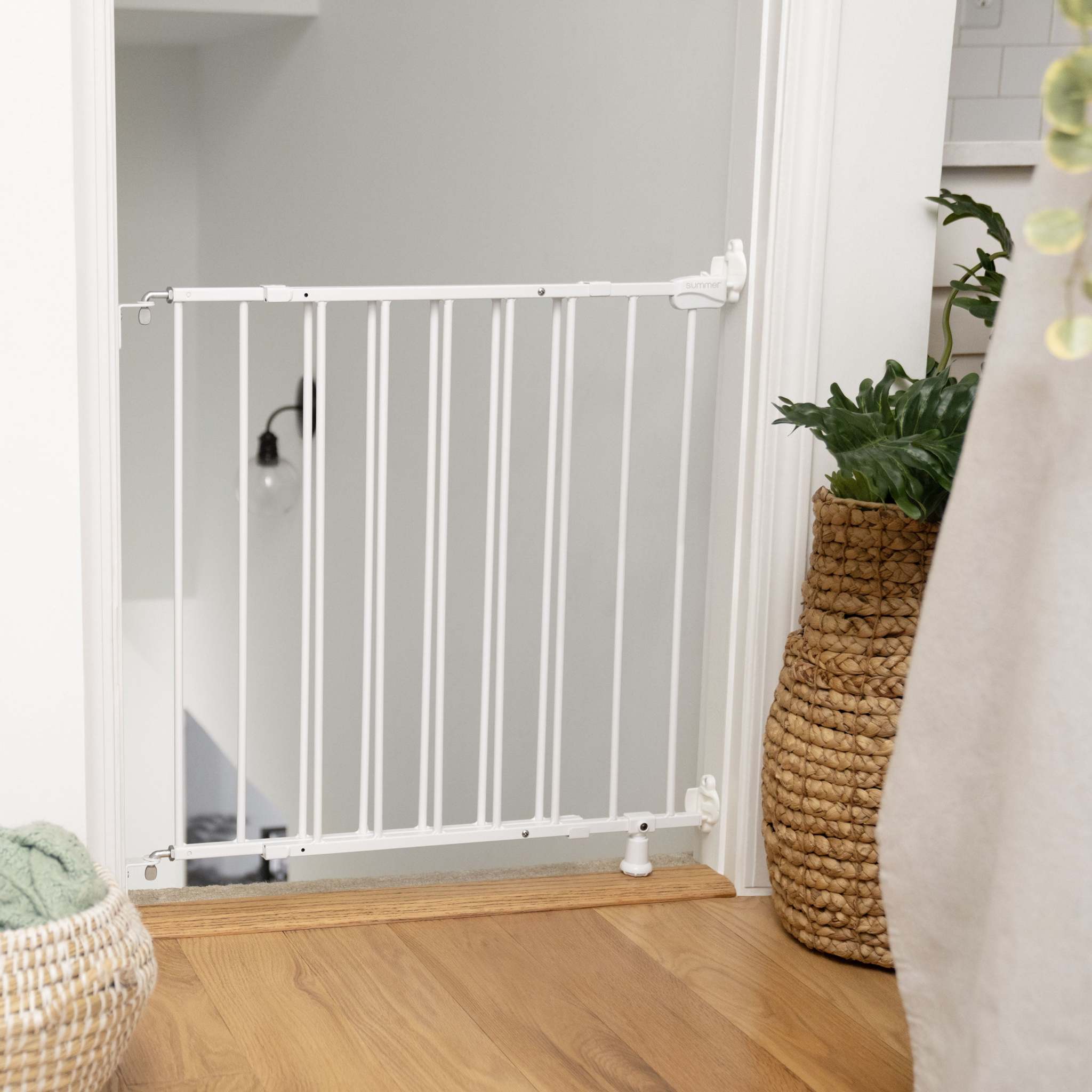 Summer by Ingenuity white metal Stairway 42W Series safety gate for babies and pets at top of stairs