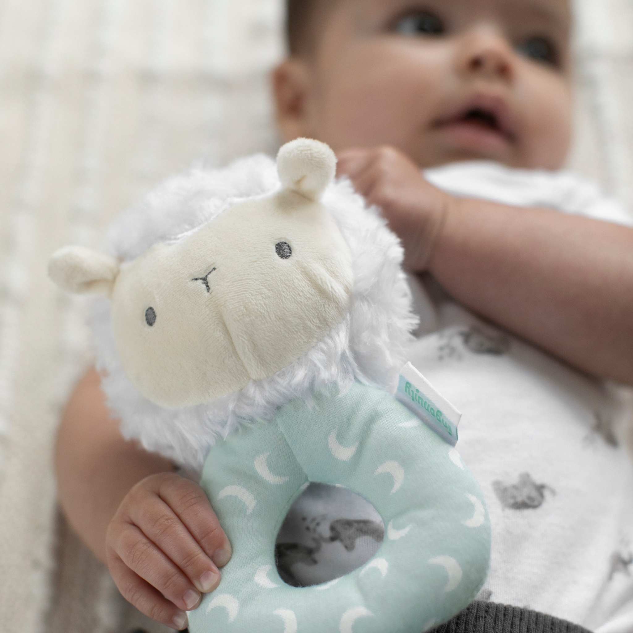 Sheppy the Sheep plush ring rattle for infants with soft fabric and gentle sound