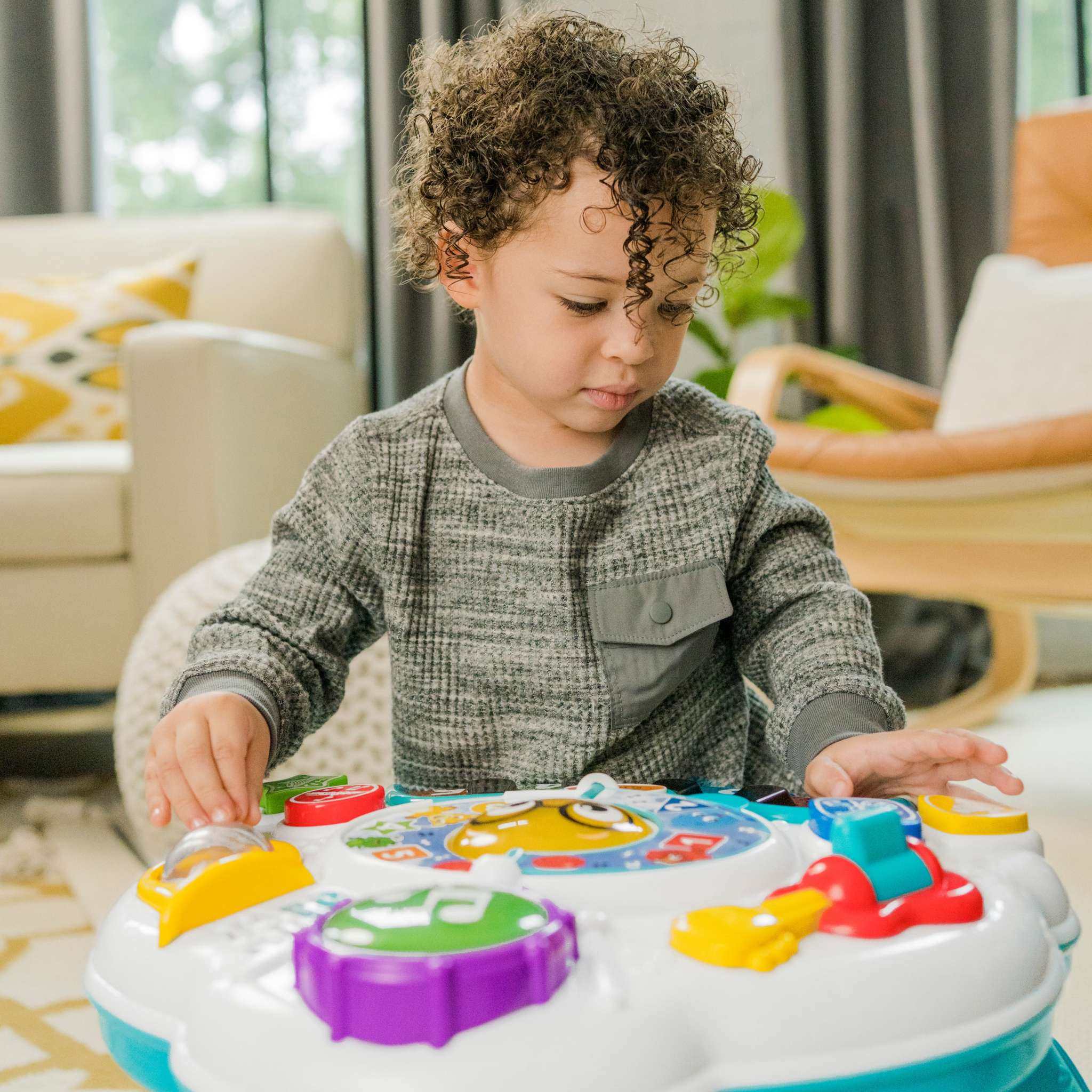 Baby Einstein Discovering Music Activity Table with piano keys and instruments