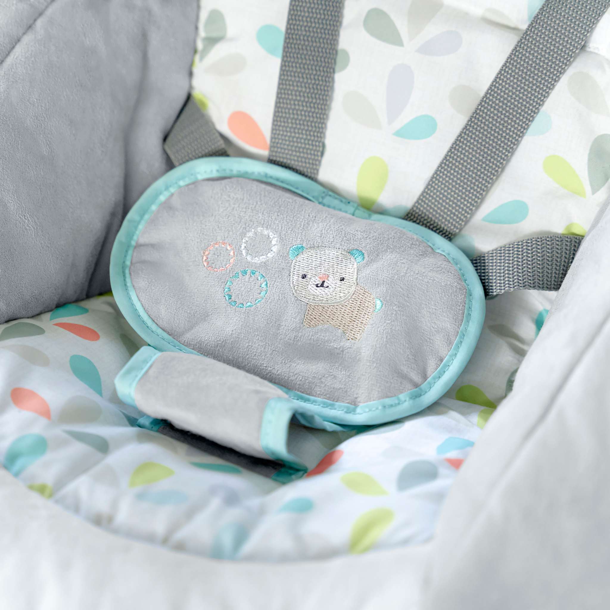 Comfort 2 Go Portable Swing with plush forest toys and soothing melodies for babies on the go